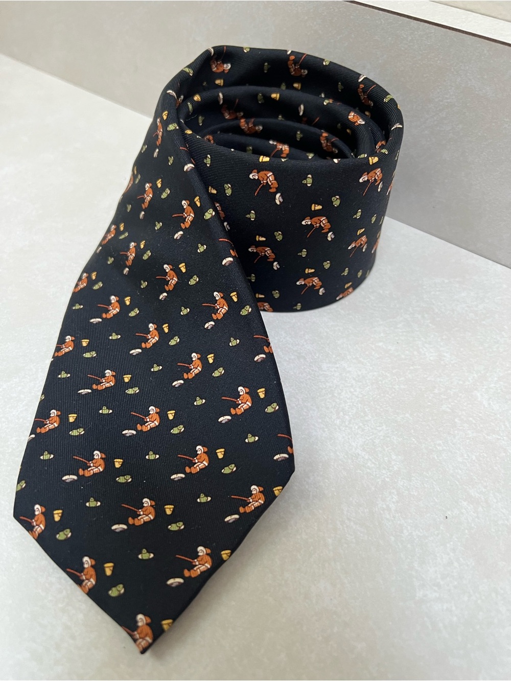 Hermès Black Silk Tie with Ice Fishing Pattern Design 7933 MA Made in France